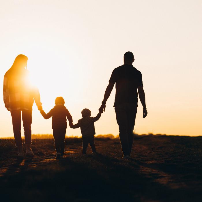 happy family silhouette sunset