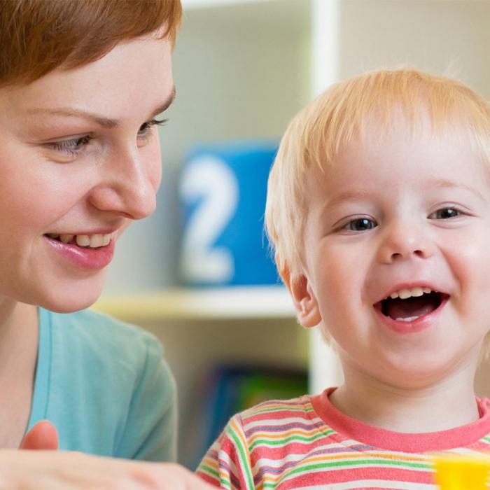 Happy mommy with a smiling baby.