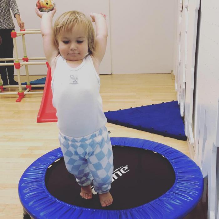 The girl on the little trampoline.