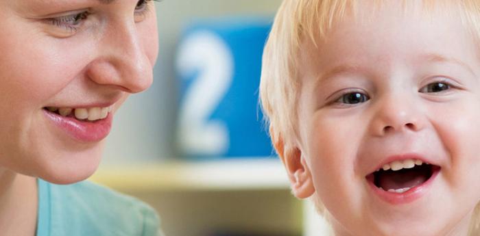 Happy mommy with a smiling baby.