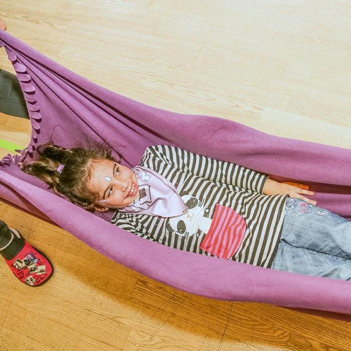 Young pirate girl relaxing on a hammock.