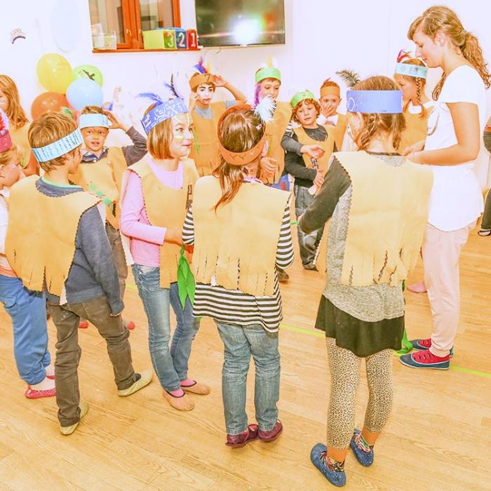 Children dressed as Indian men and women at a party.