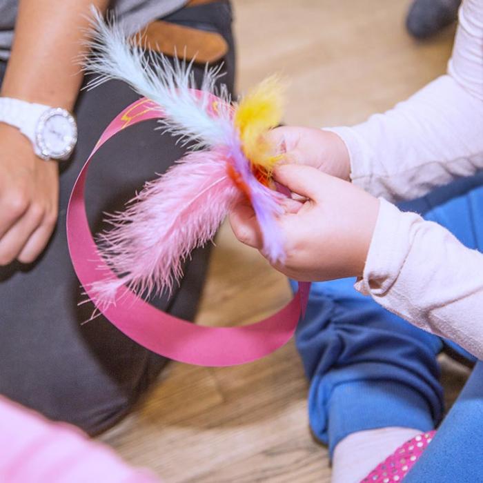 Making Indian feathers.