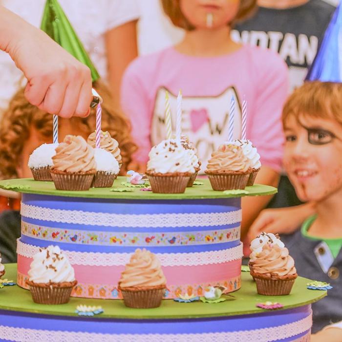 Lighting candles on the cake.