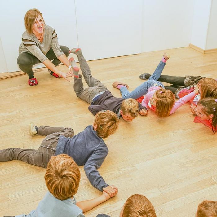 Kids at a party with an animator.