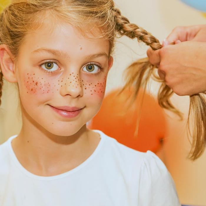 Pippi Longstocking braiding a braid.