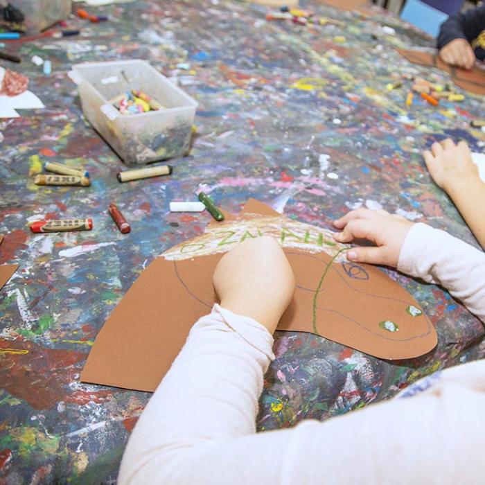 Kids creating props for a party.